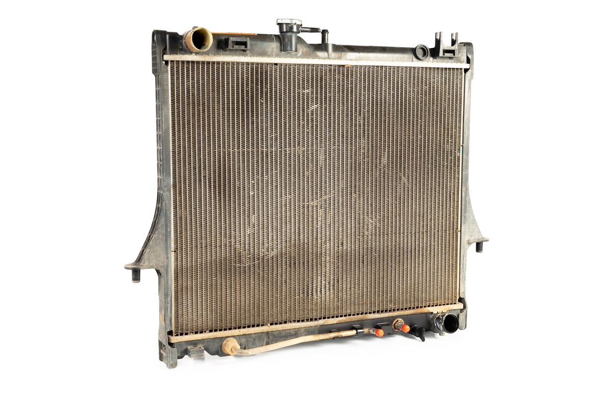 A radiator cooling component being inspected for a vehicle
