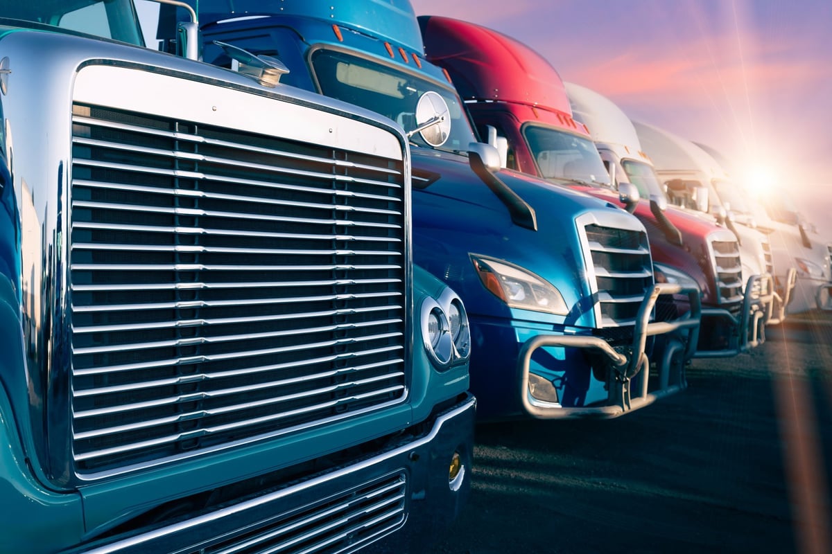 Long-haul container trucks carrying commercial cargo