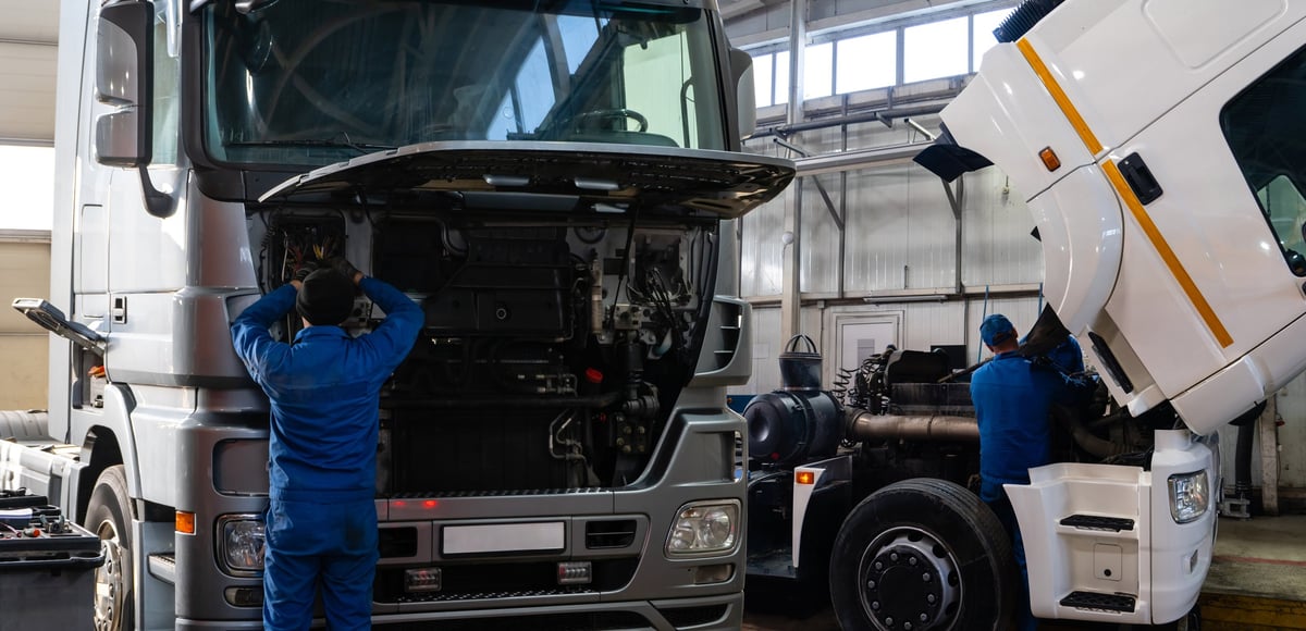 A commercial truck repair workshop with heavy-duty vehicles