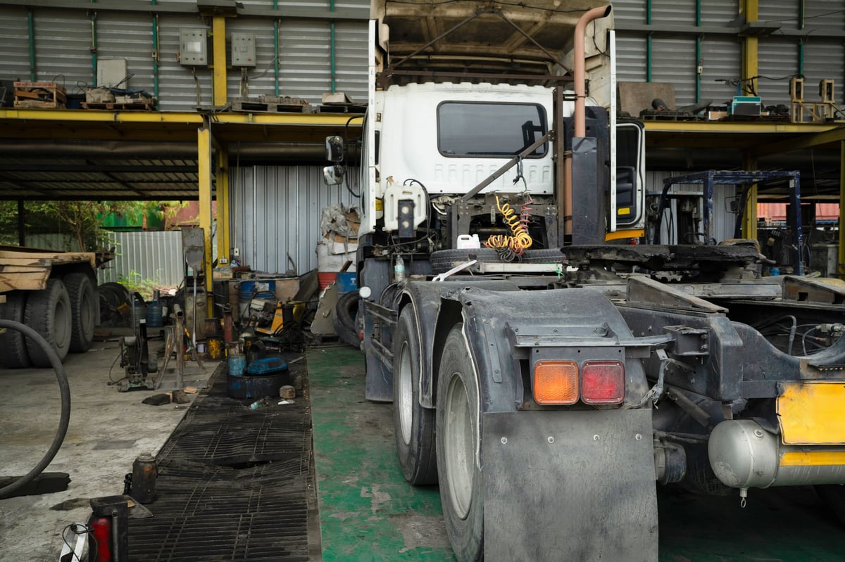 Industrial garage with a truck and tools